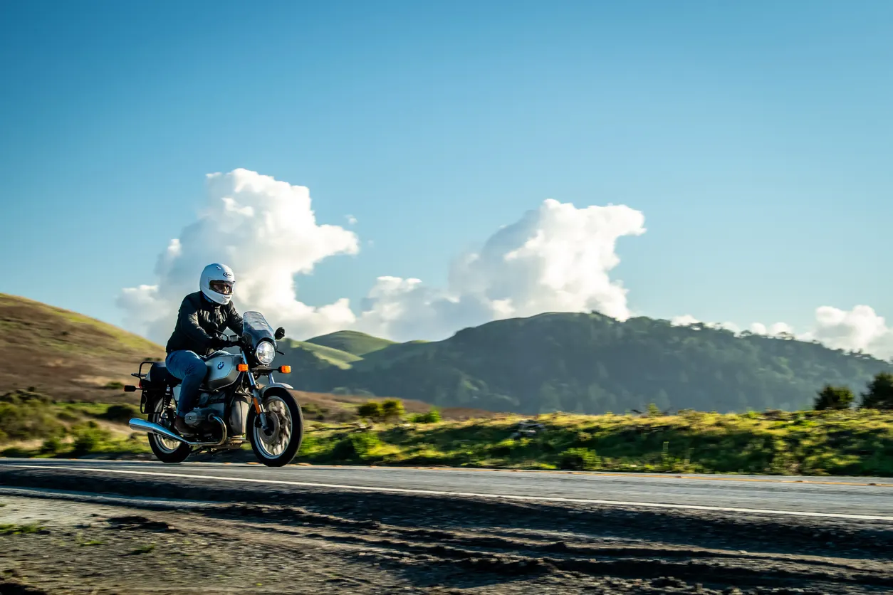 Assorted powersports parts on workbench